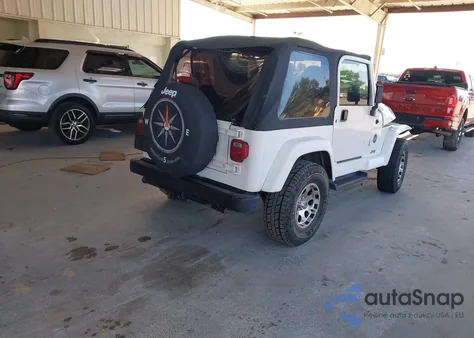 2002 Jeep Wrangler Sahara из США, поврежденный, VIN 1J4FA59S22P772061